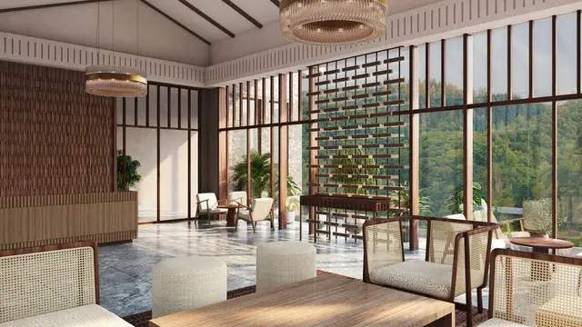 Greenhill Club reception lobby with timber-slatted double-height ceiling