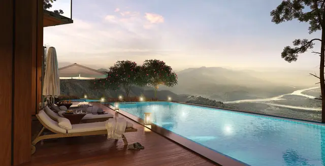Infinity pool overlooking the river valley at dusk