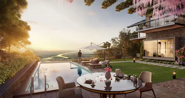 Villa terrace and pool at sunset overlooking the river, Terra Grande Rishikesh Hills