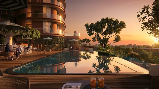 Eldeco Terra & Sol podium swimming pool and deck at sunset